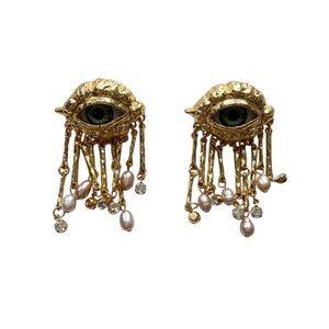 Vintage sad eye stud earrings